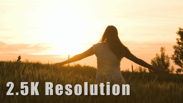 Happy Girl Dancing into Sunset Field Happy Girl Dancing into Sunset Field
