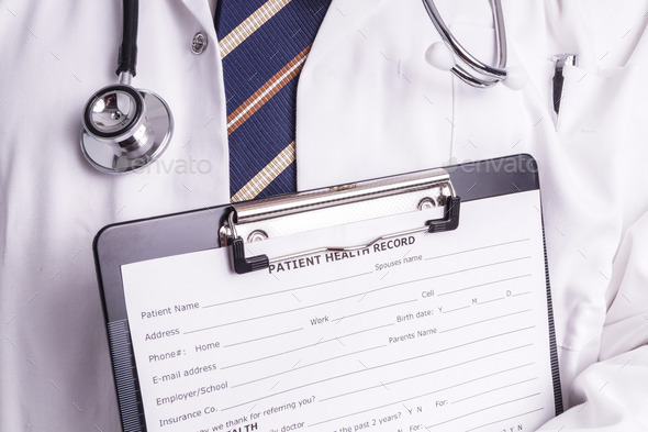 Male doctor ready to write patient information