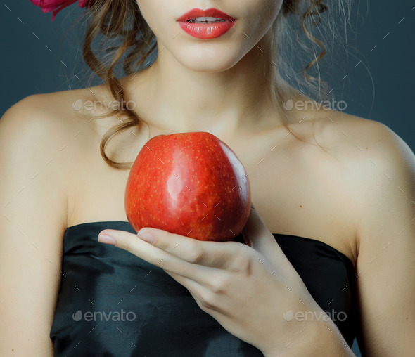 Red lips with red apple. (Misc) Photo Download