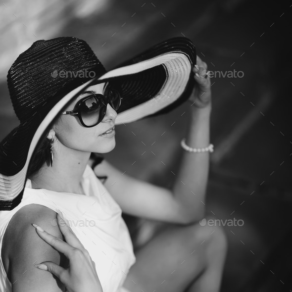 Young female wearing hat. (Misc) Photo Download