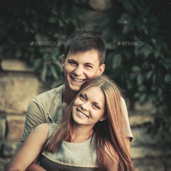 Young couple embracing. (Misc) Photo Download