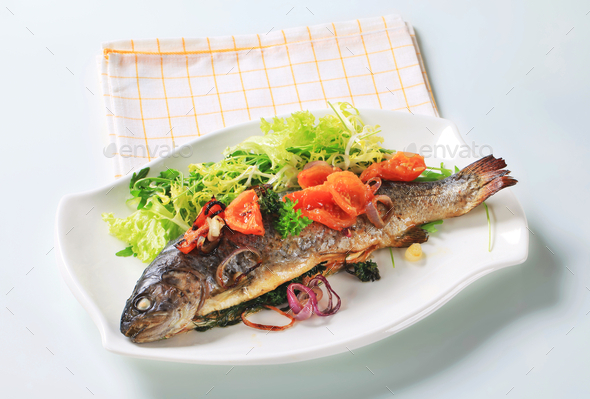 Baked trout with tomatoes and green salad (Misc) Photo Download