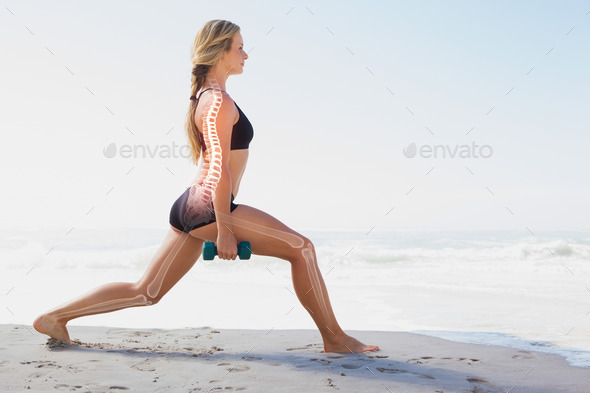 Digital composite of Highlighted bones of exercising woman