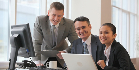 Businesspeople discussing work Businesspeople discussing work
