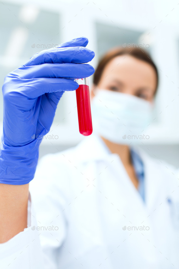 close up of scientist holding test tube in lab (Misc) Photo Download