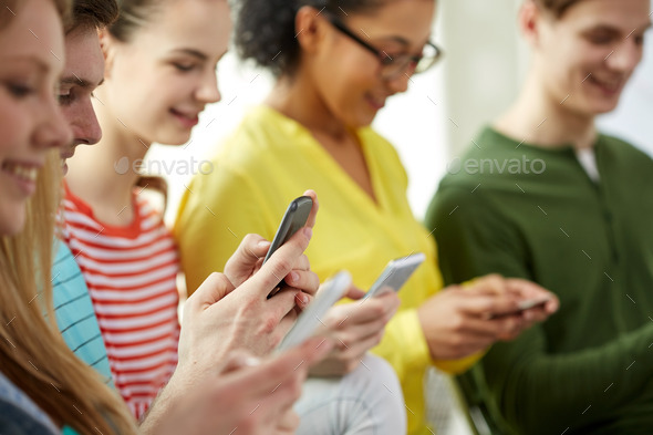 close up of students with smartphones at school (Misc) Photo Download