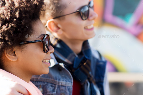 happy teenage friends in shades outdoors (Misc) Photo Download