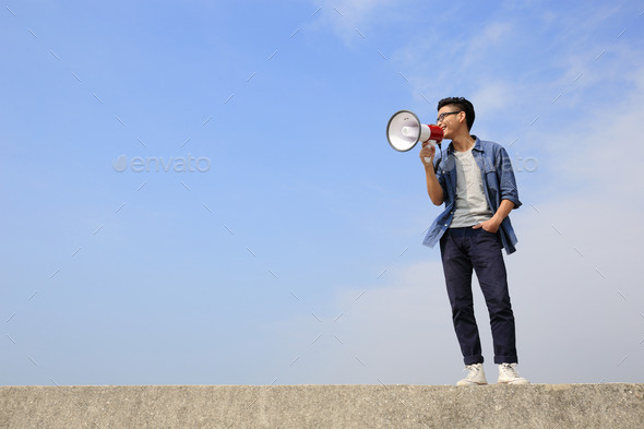 young man shout megaphone (Misc) Photo Download