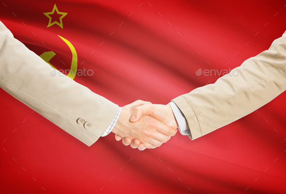 Businessmen handshake with flag on background - USSR - Soviet Union