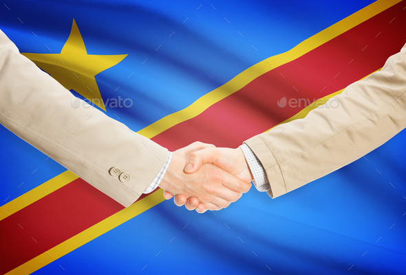 Businessmen handshake with flag on background - Democratic Republic of the Congo - Congo-Kinshasa