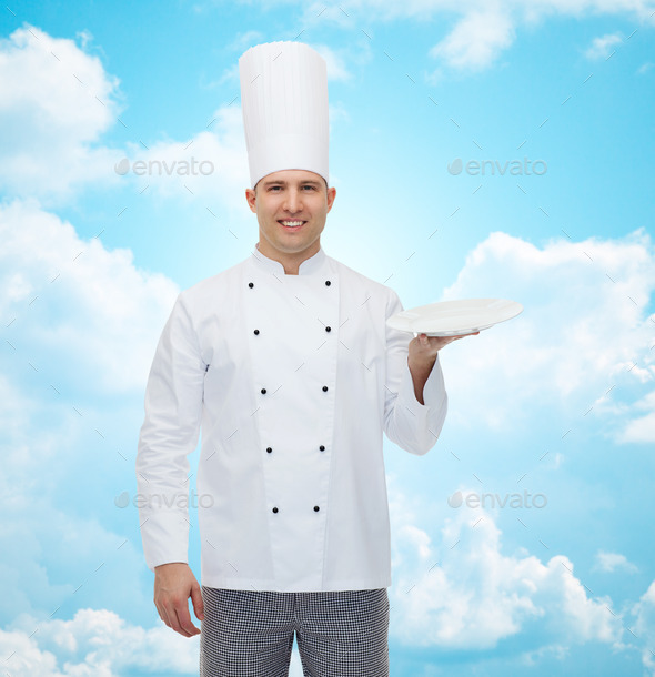 happy male chef cook showing empty plate