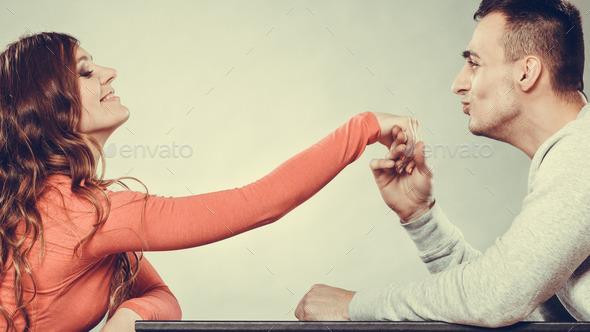 Man husband kissing woman hand. Love couple.