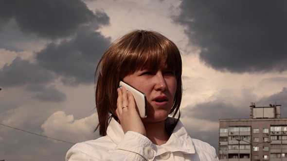 Girl Speaking On The Mobile Phone Emotionally Girl Speaking On The Mobile Phone Emotionally