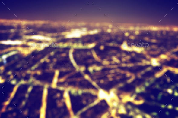 Big city night lights bokeh, blurred background. Vintage