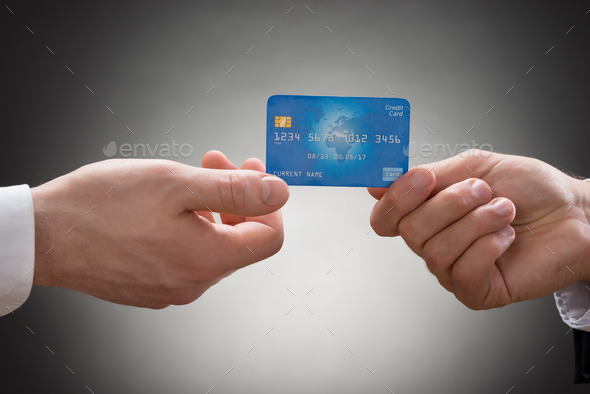 Businesspeople Hands With Credit Card