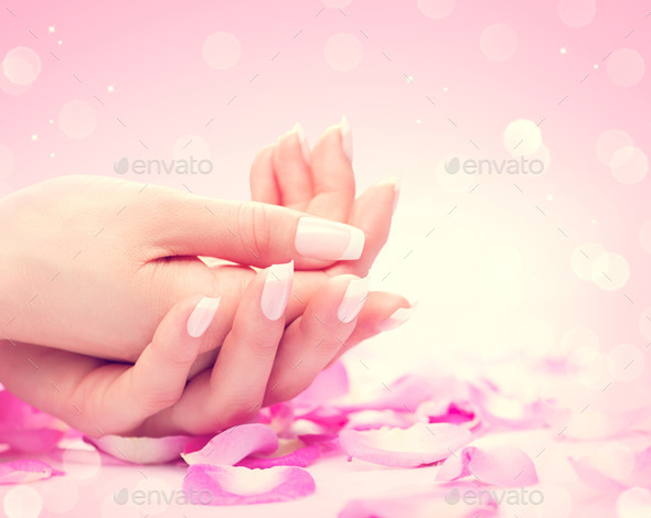 Hands spa. Manicured female hands, soft skin, beautiful nails