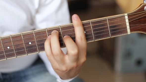 Hands Playing Acoustic Guitar Hands Playing Acoustic Guitar