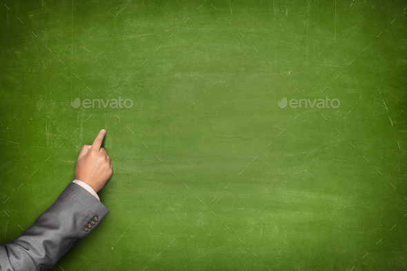 Blank blackboard with businessman hand pointing (Misc) Photo Download