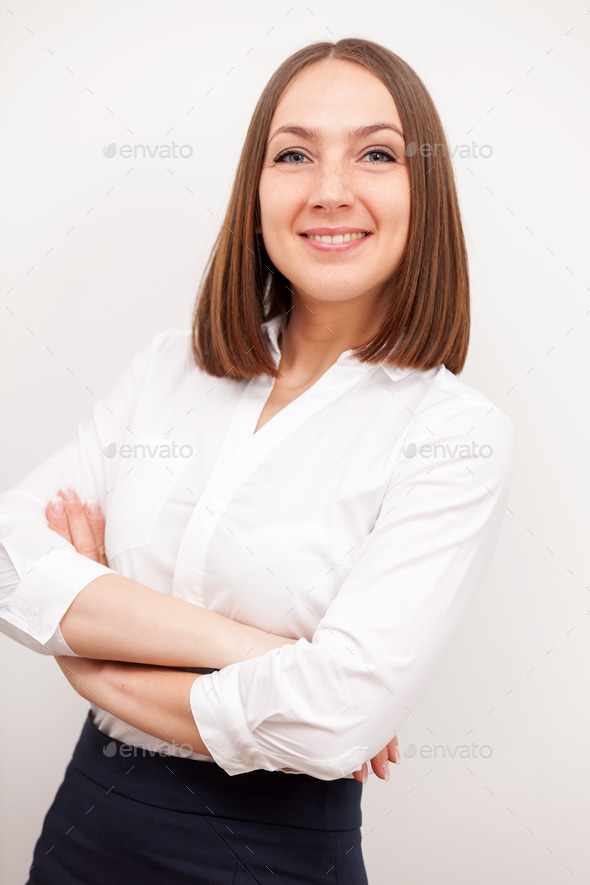 Portrait of successful brunette businesswoman over white isolate (Misc) Photo Download