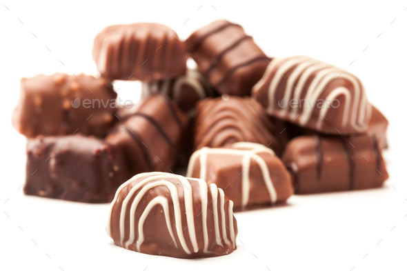 Chocolate pralines over white isolated background (Misc) Photo Download