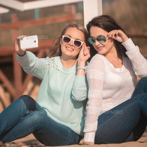 Two girls taking selfie (Misc) Photo Download