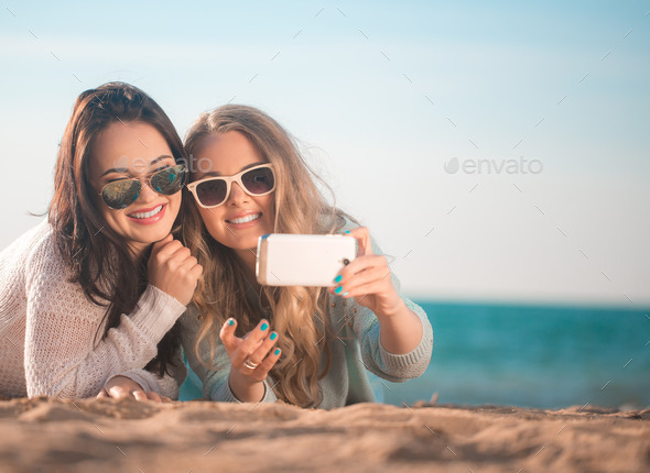 Two girls taking selfie (Misc) Photo Download