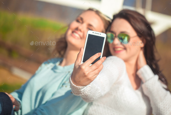 Two girls taking selfie (Misc) Photo Download