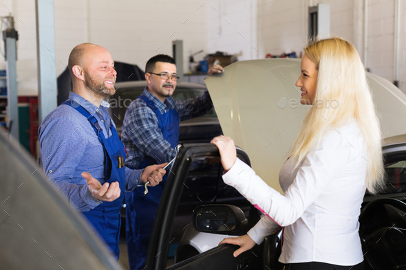 Service crew and satisfied drive (Misc) Photo Download