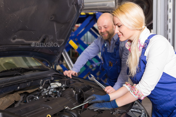 Auto service center crew near car (Misc) Photo Download