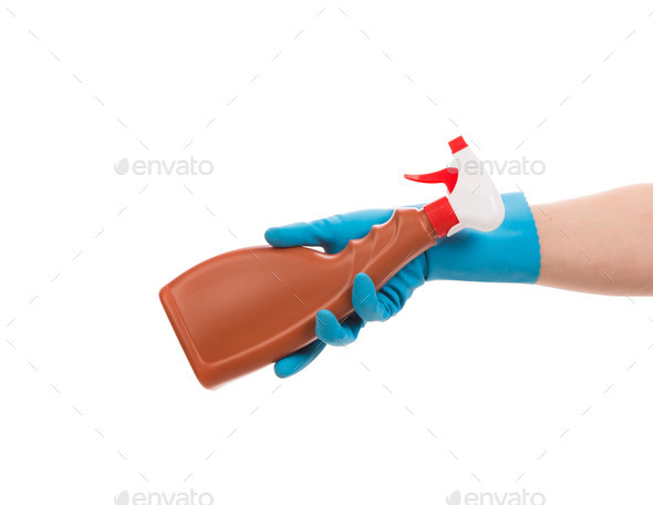 Hand holding spray bottle. (Misc) Photo Download