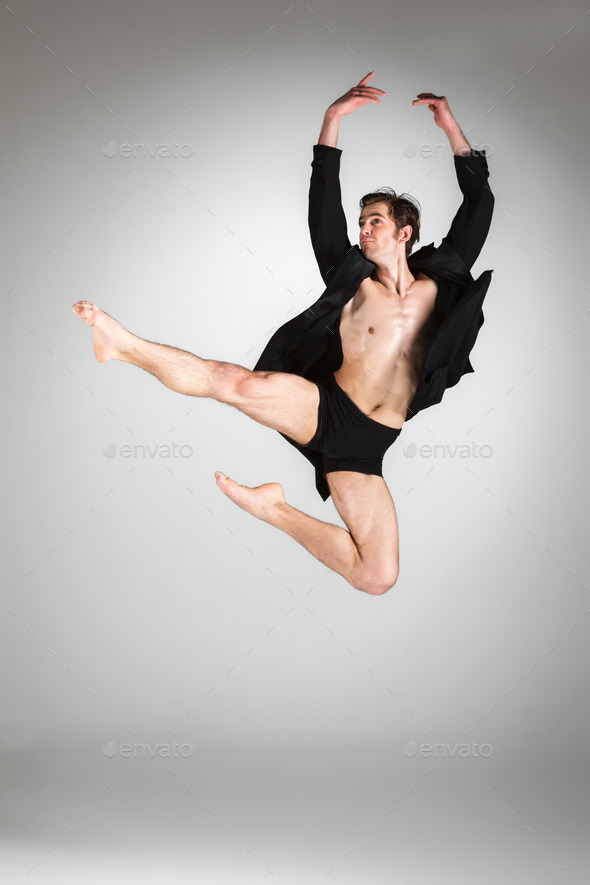 The young attractive modern ballet dancer jumping on white background (Misc) Photo Download