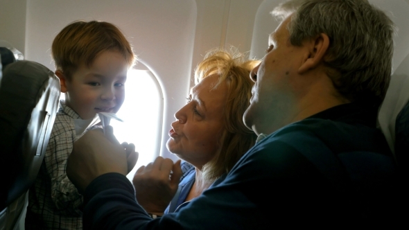 Grandparents And Little Grandson Traveling By Grandparents And Little Grandson Traveling By