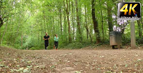 Young Couple Running in Nature Young Couple Running in Nature