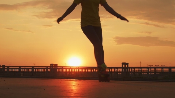 VideoHive The Girl Skates On The Bridge At Sunset 12113710 VideoHive The Girl Skates On The Bridge At Sunset 12113710