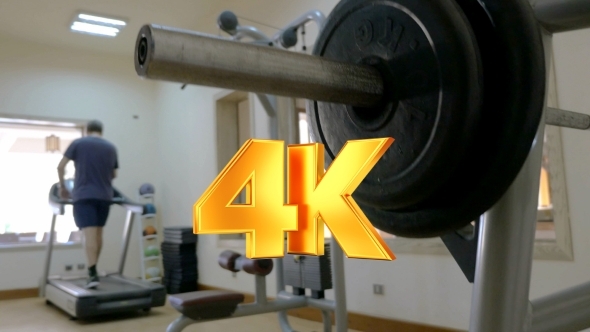 VideoHive Sportsman Putting Disk Weight On The Barbell 12153346 VideoHive Sportsman Putting Disk Weight On The Barbell 12153346