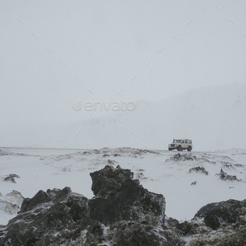 Adventure vehicle in a snowstorm