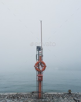 Sea view on a foggy day with sailing accessories