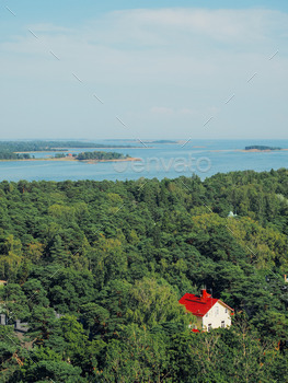 Shot of finnish archipelago and a red house