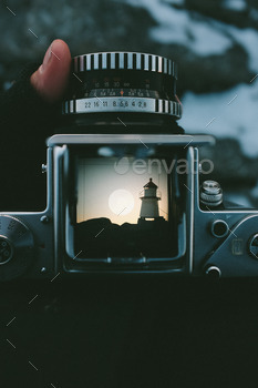 Through the viewfinder.