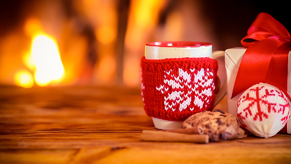 Christmas Decorations Against Fireplace