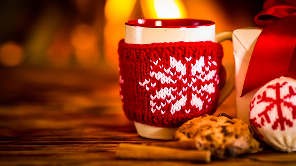 Christmas Decorations Against Fireplace