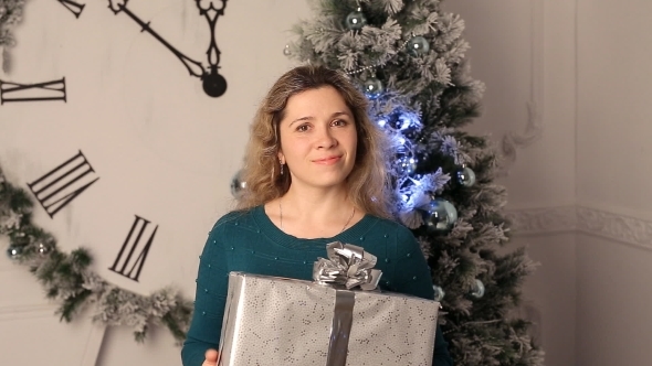 Smiling Girl With Christmas Gifts