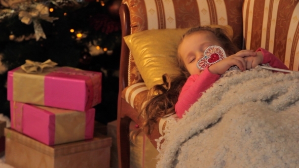 Girl Dreaming About Christmas Gifts