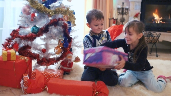 Children Opening Their Christmas Gifts