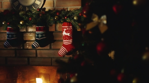 Socks For Christmas Gifts Over The Fireplace