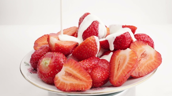 VideoHive Pouring Cream On Strawberries 16288791 VideoHive Pouring Cream On Strawberries 16288791