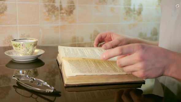 VideoHive Man Leafing Through Pages 16998567 VideoHive Man Leafing Through Pages 16998567