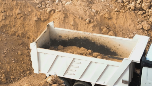 VideoHive Dump Truck Being Loaded With Soil By Shovel 17018546 VideoHive Dump Truck Being Loaded With Soil By Shovel 17018546