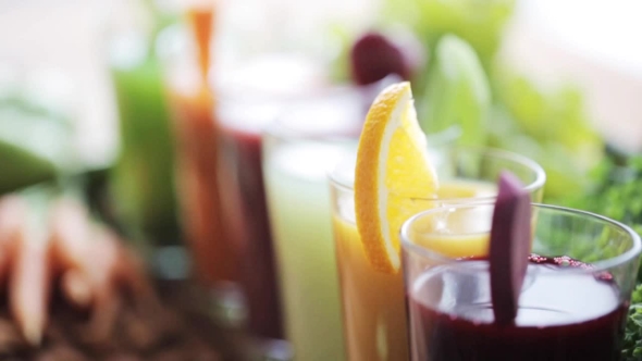 Videohive Hand Taking Glass Of Vegetable Juice From Table 17517763
