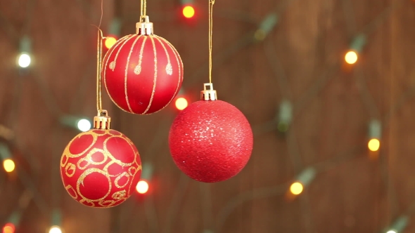 Red Christmas Balls Hanging On Strings